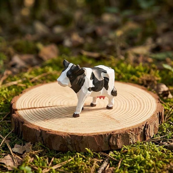 Black and White Dairy Cow, hand-carved wooden figurine