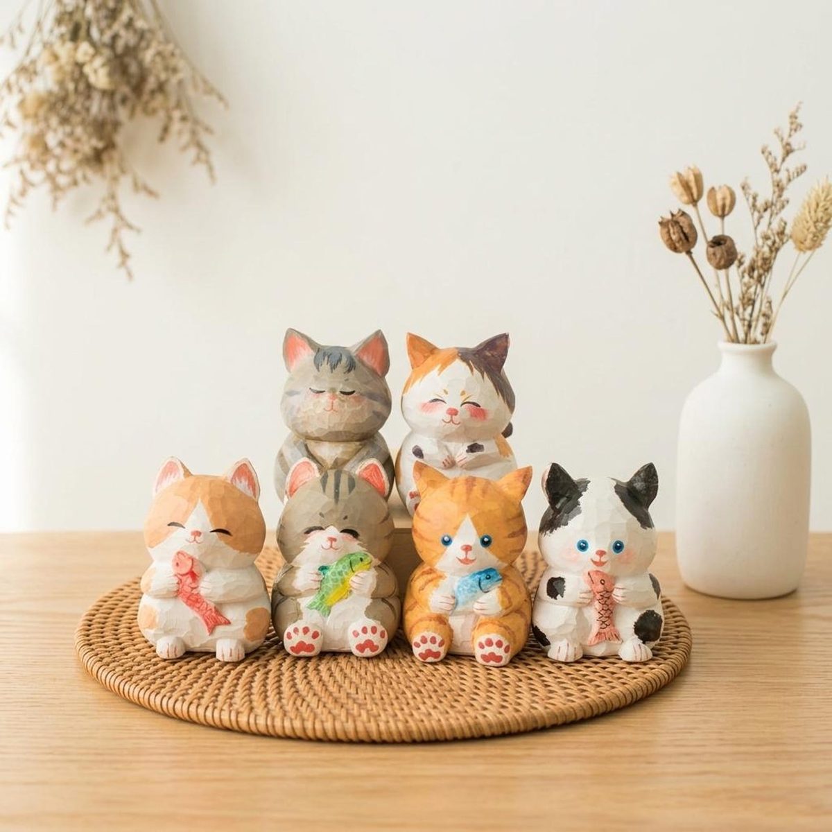 Cat Holding a Fish, hand-carved wooden figurine