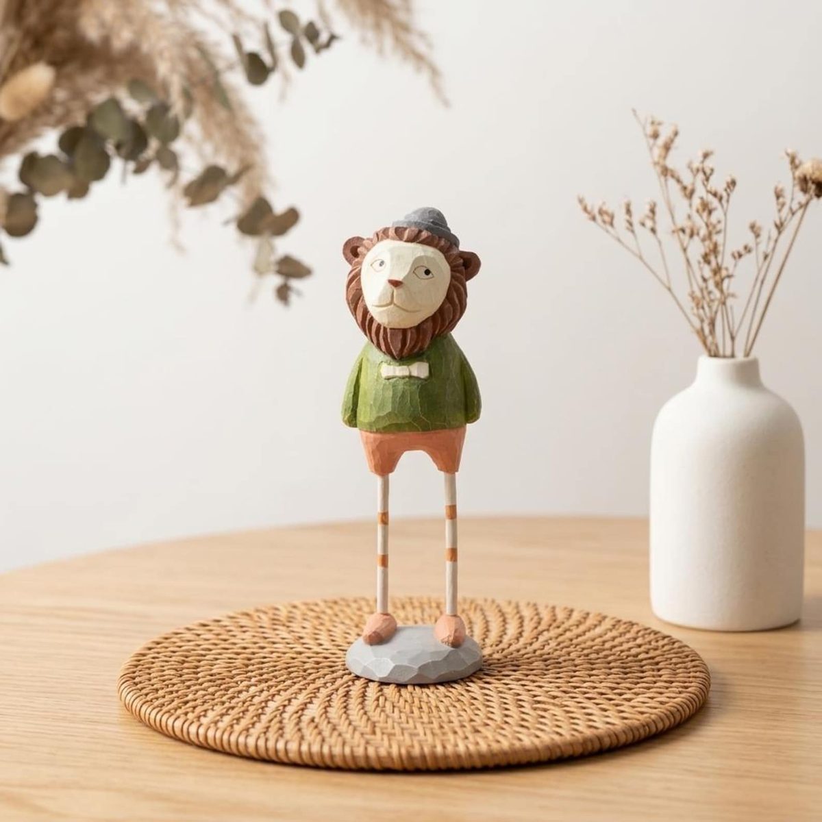 Dapper Lion, hand-carved wooden figurine