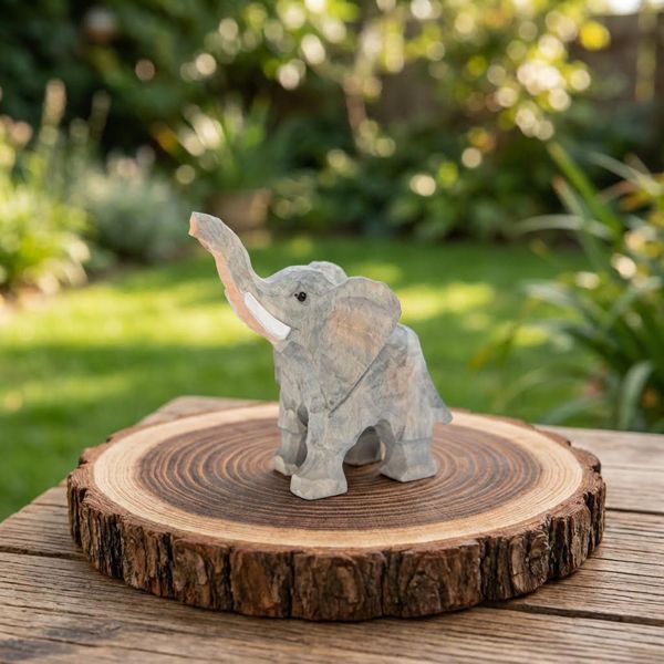Elephant, Trunk Raised, hand-carved wooden figurine