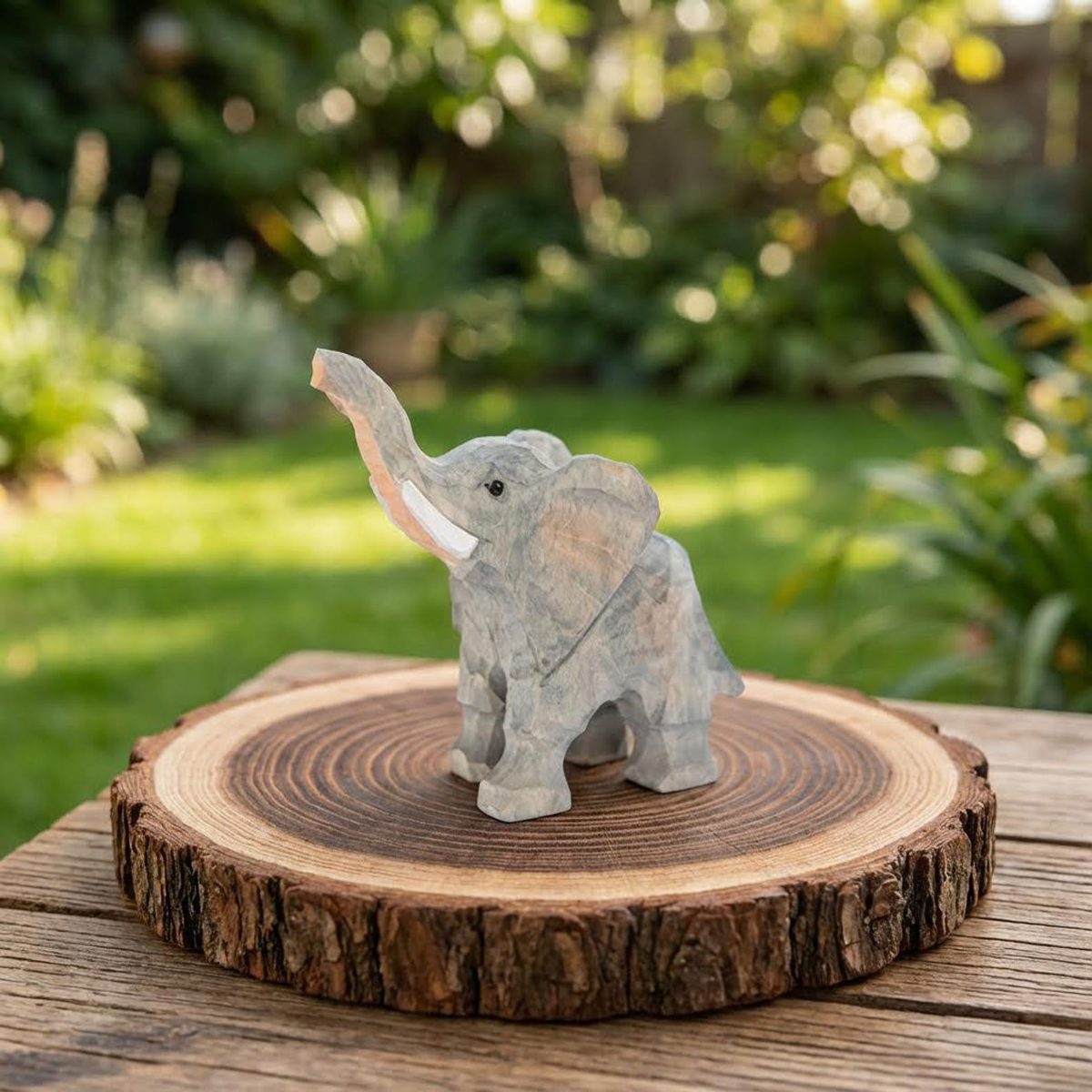 Elephant, Trunk Raised, hand-carved wooden figurine