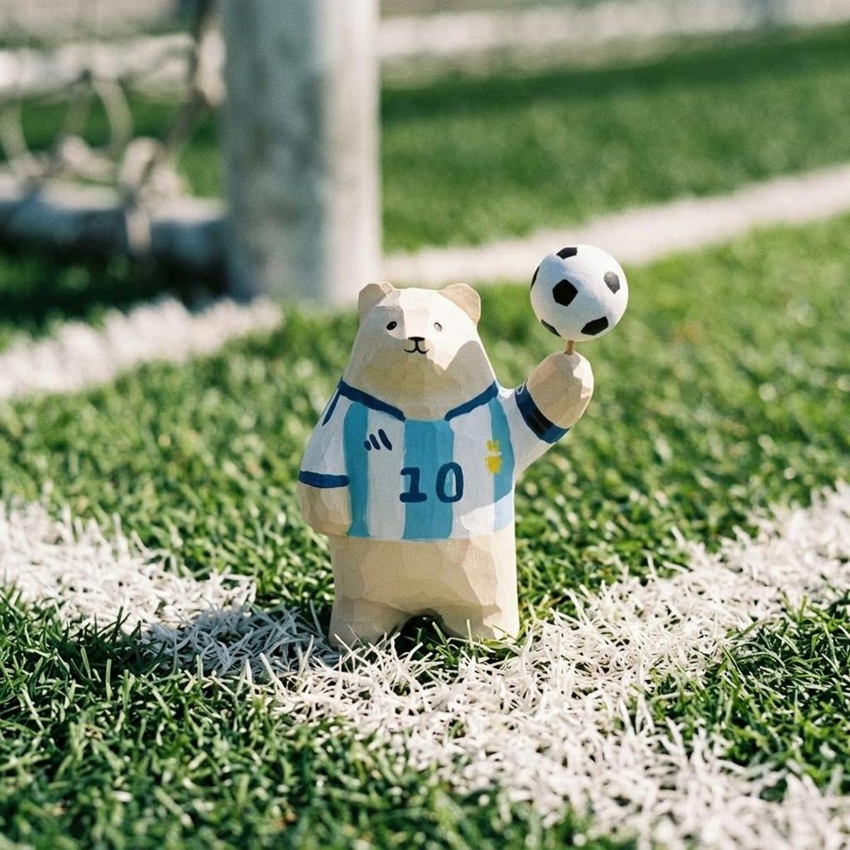 Football Bear, hand-carved wooden figurine