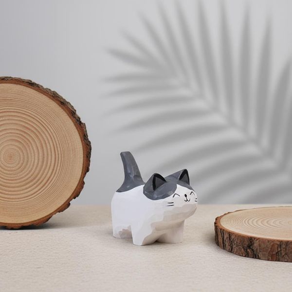 Faceted Tuxedo Desk Cat, hand-carved wooden figurine