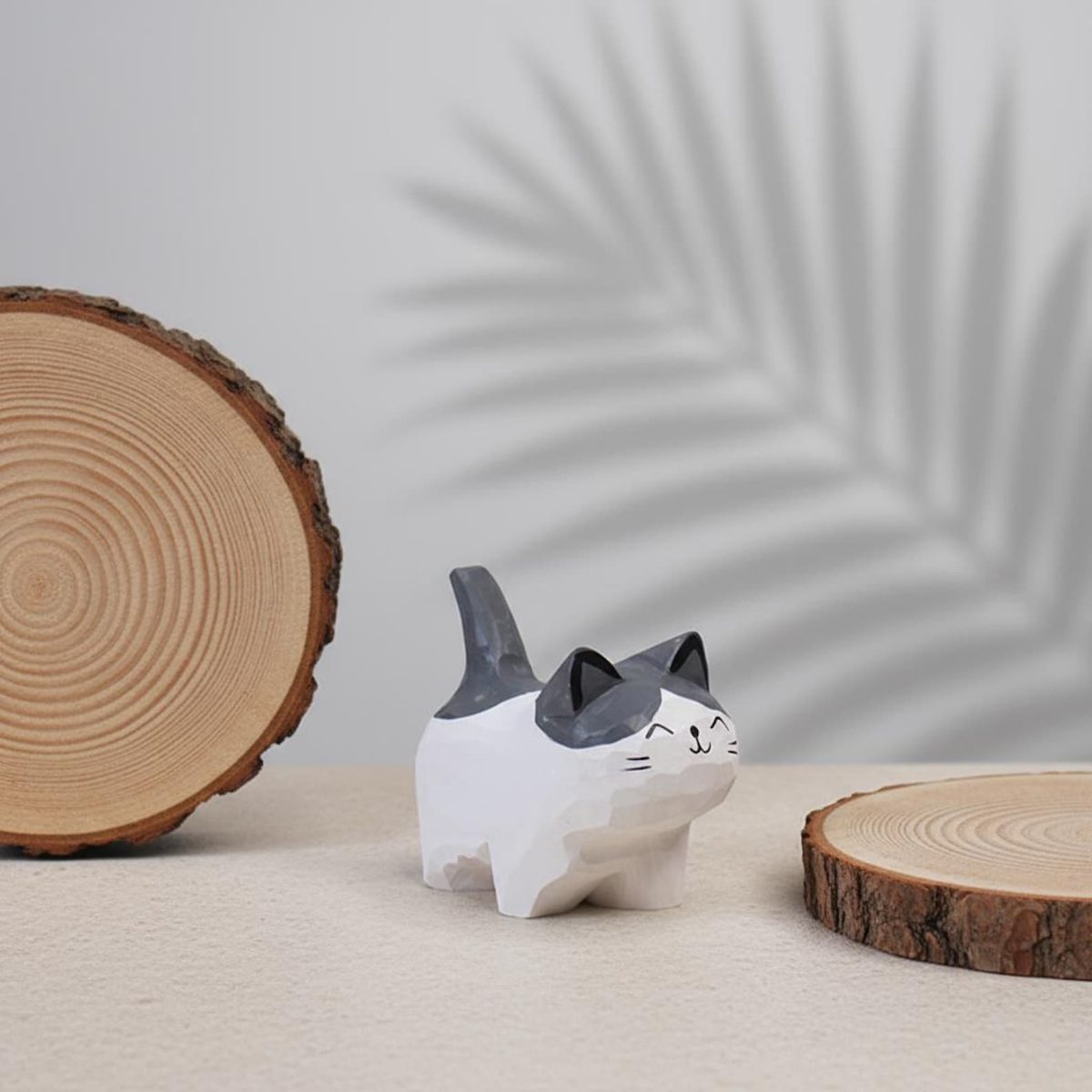 Faceted Tuxedo Desk Cat, hand-carved wooden figurine